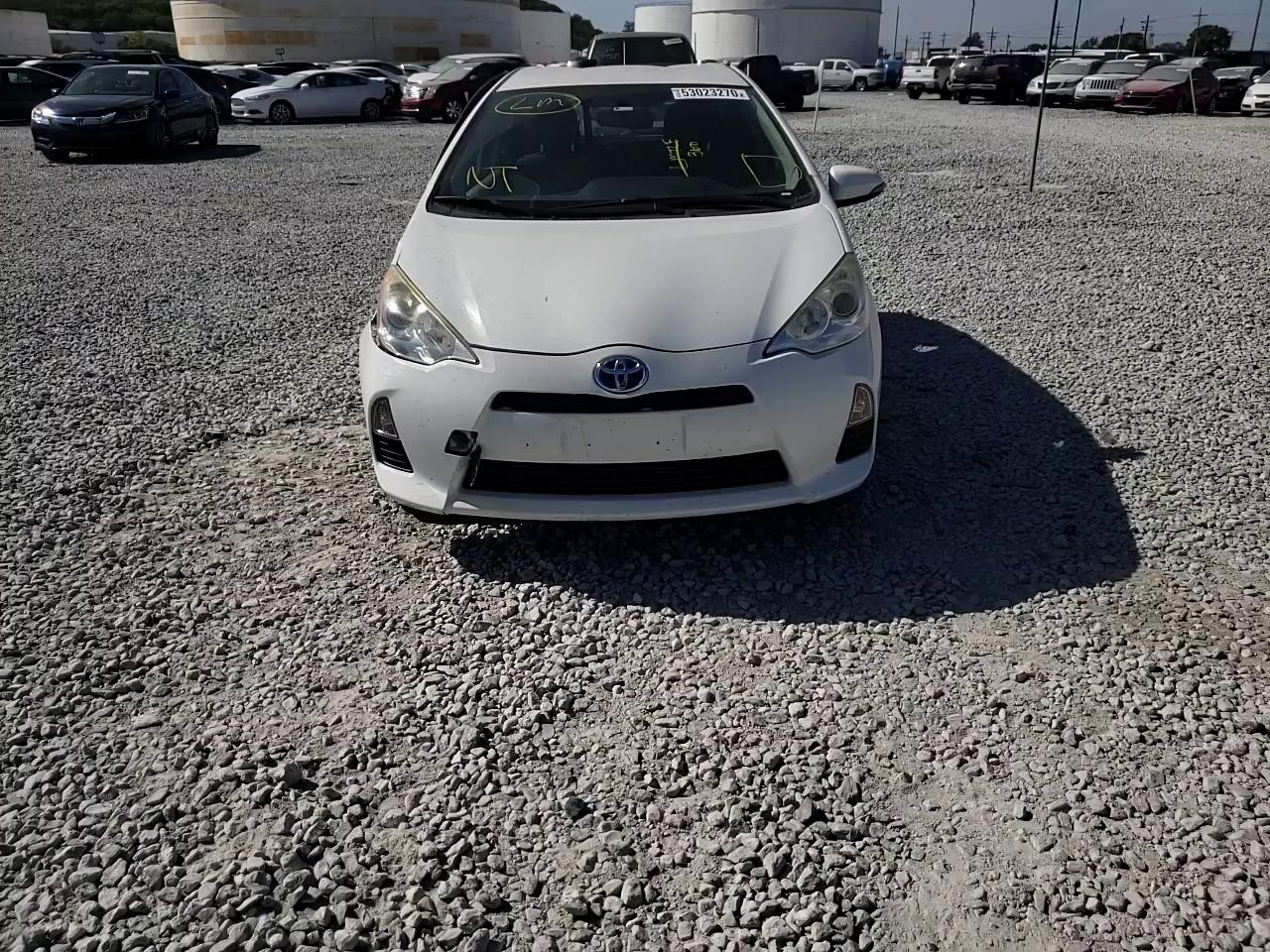 Photo 10 VIN: JTDKDTB3XE1559465 - TOYOTA PRIUS C 