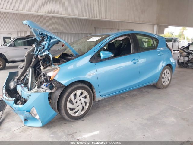 Photo 1 VIN: JTDKDTB3XF1094512 - TOYOTA PRIUS C 