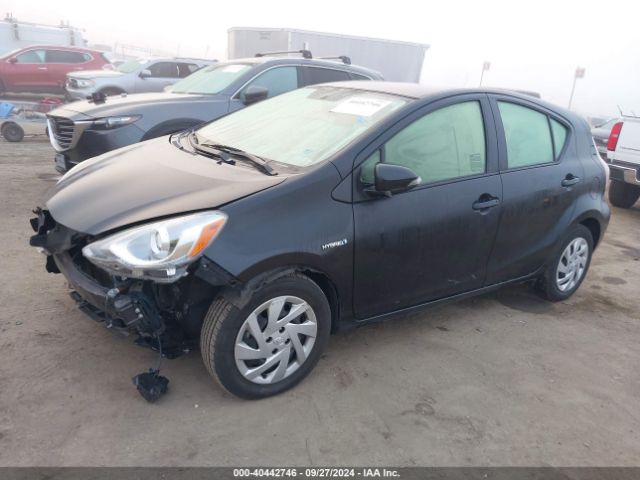 Photo 1 VIN: JTDKDTB3XF1105637 - TOYOTA PRIUS C 