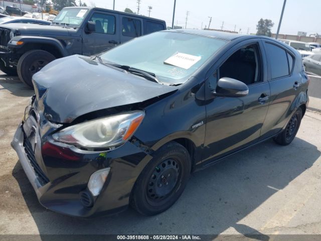 Photo 1 VIN: JTDKDTB3XF1577448 - TOYOTA PRIUS C 