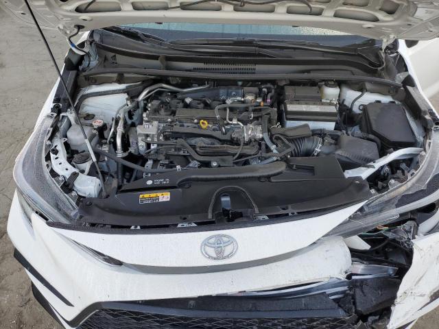 Photo 10 VIN: JTDP4MCE9R3521361 - TOYOTA COROLLA SE 