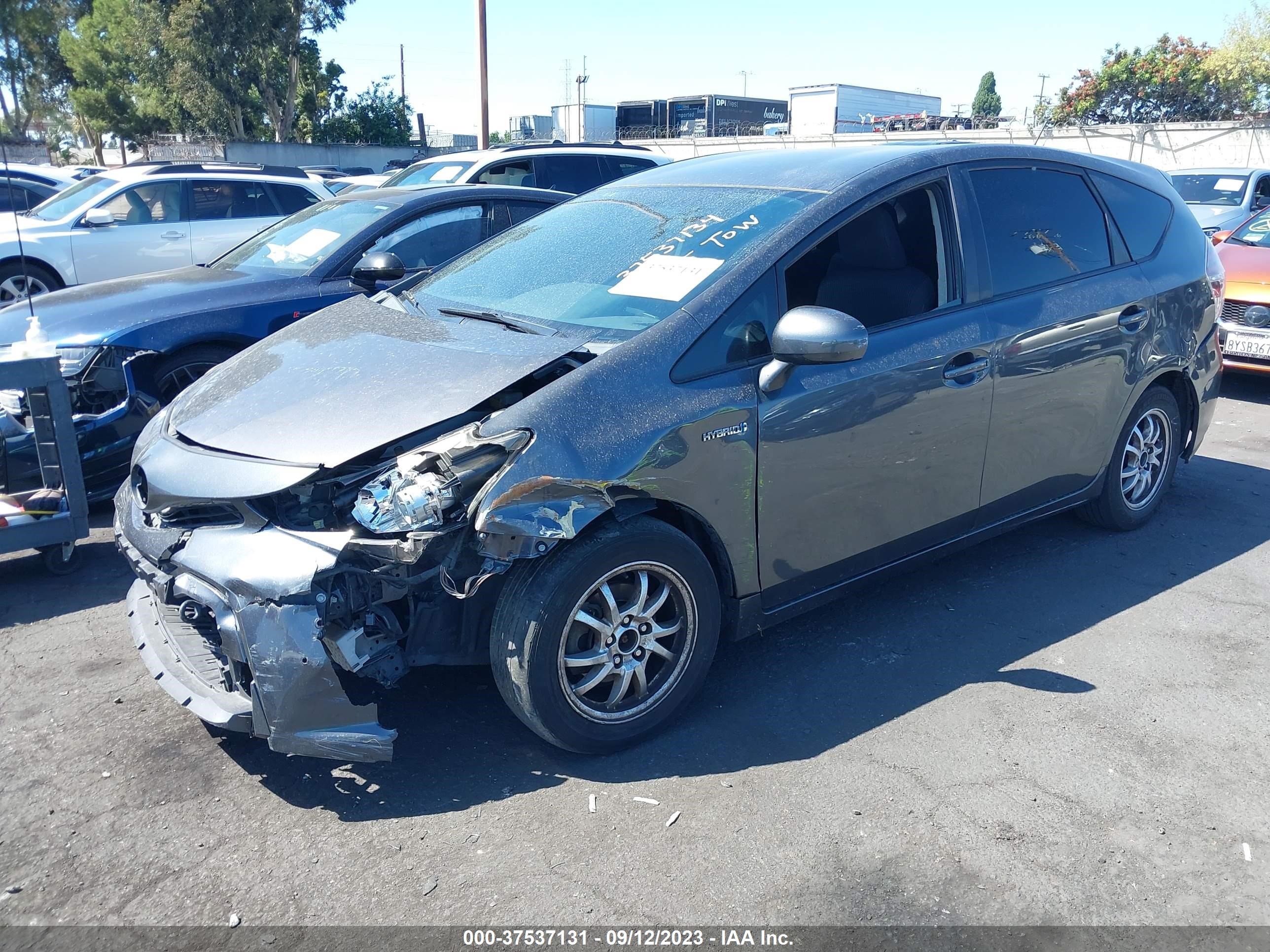 Photo 1 VIN: JTDZN3EUXFJ024329 - TOYOTA PRIUS V (+) 