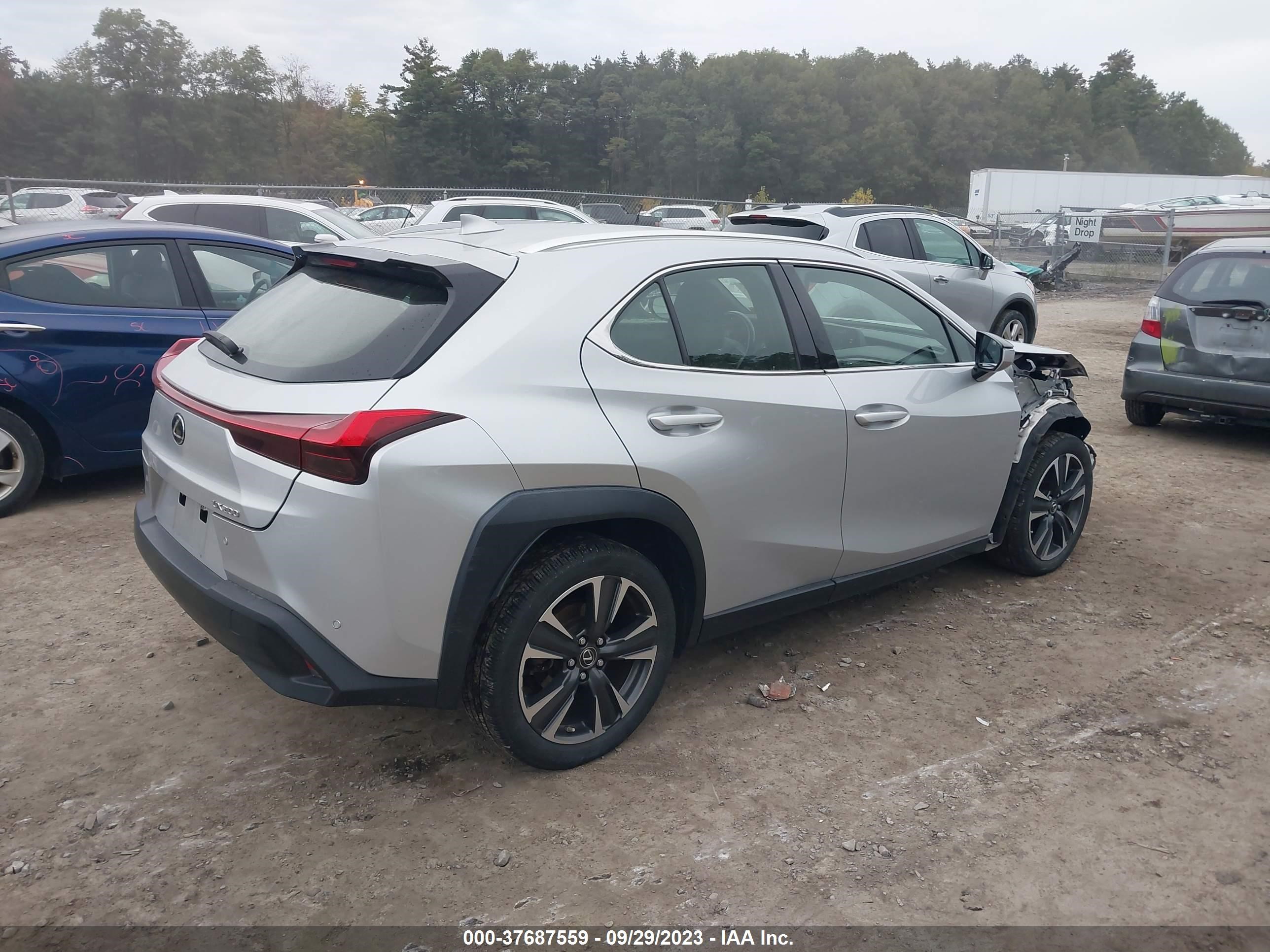 Photo 3 VIN: JTHY3JBH8K2000711 - LEXUS UX 