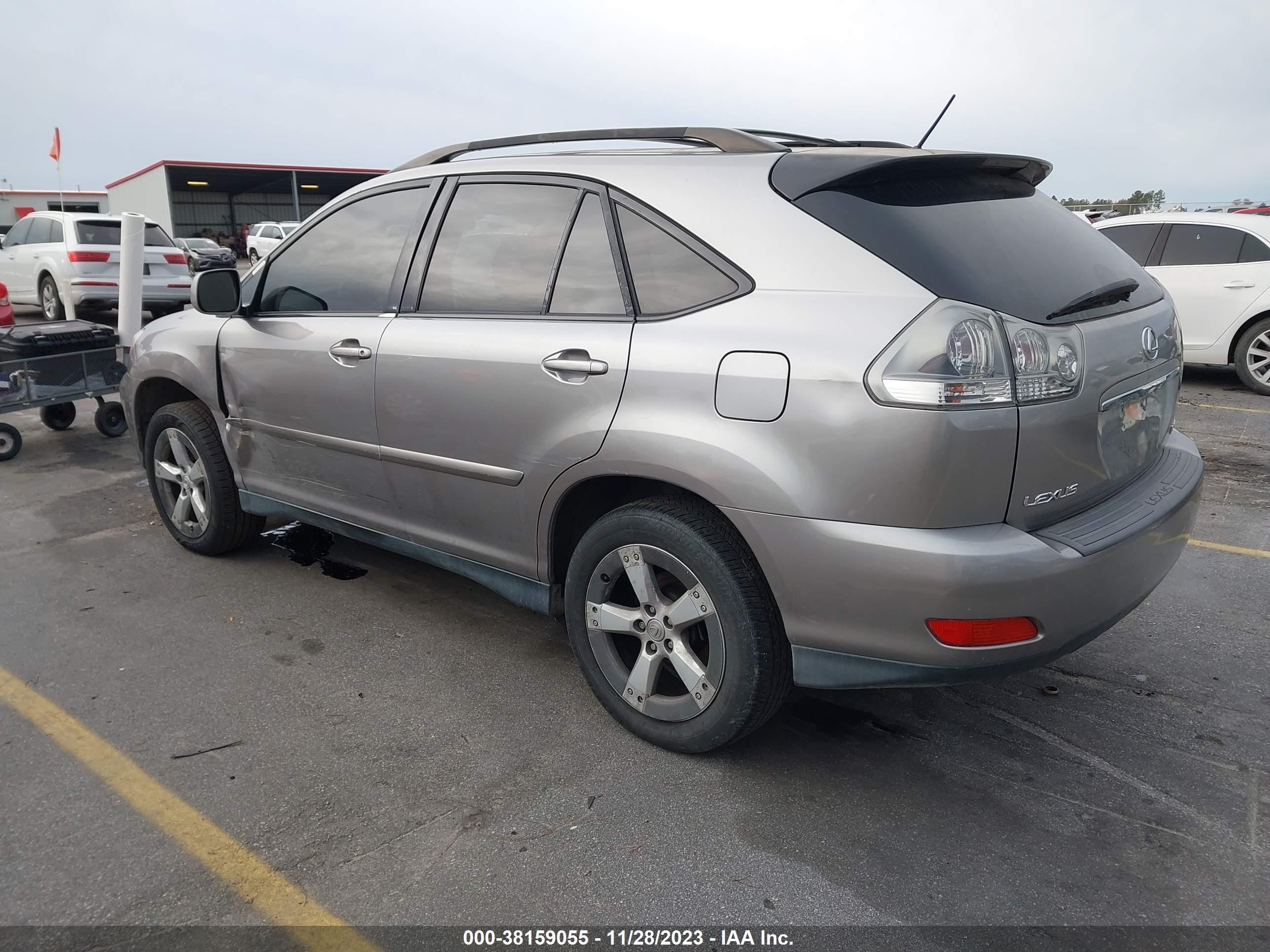 Photo 2 VIN: JTJGA31U050057575 - LEXUS RX 