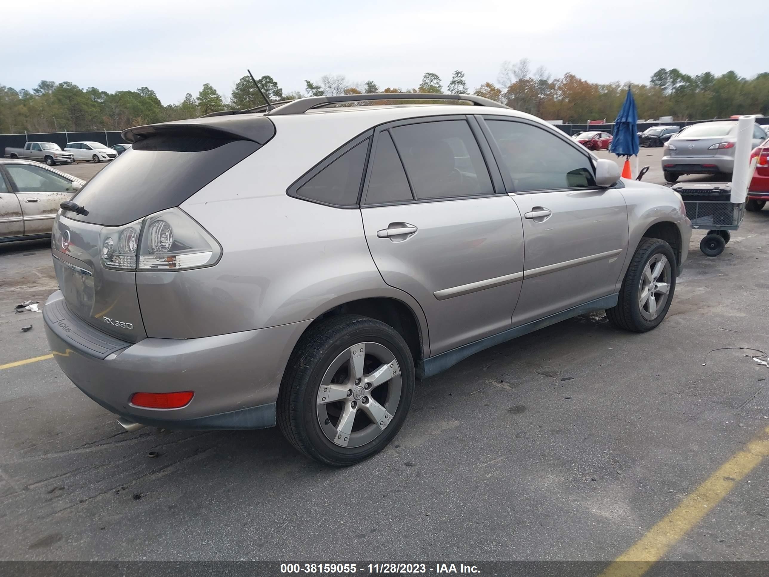 Photo 3 VIN: JTJGA31U050057575 - LEXUS RX 