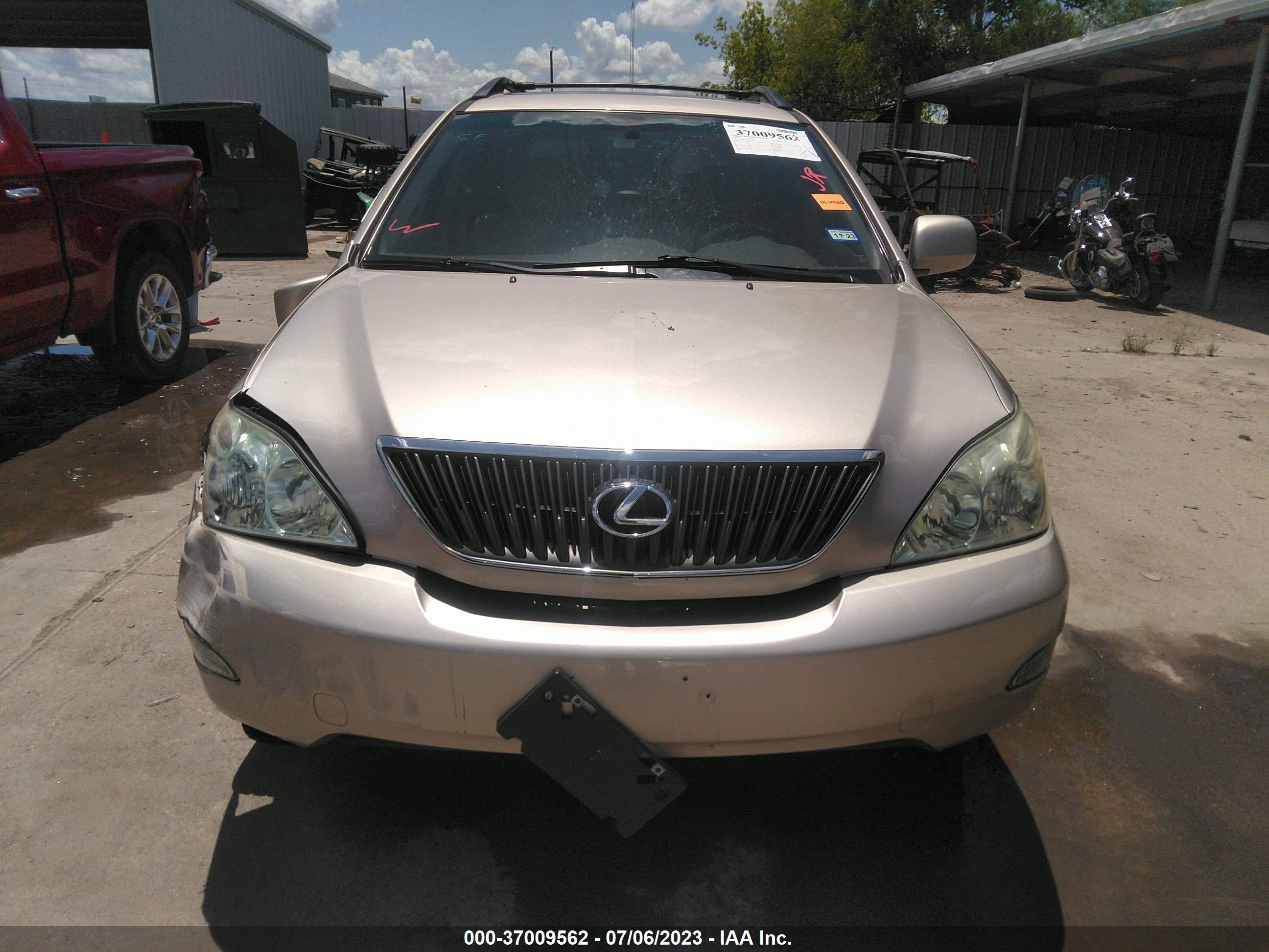 Photo 11 VIN: JTJGA31U340024617 - LEXUS RX 