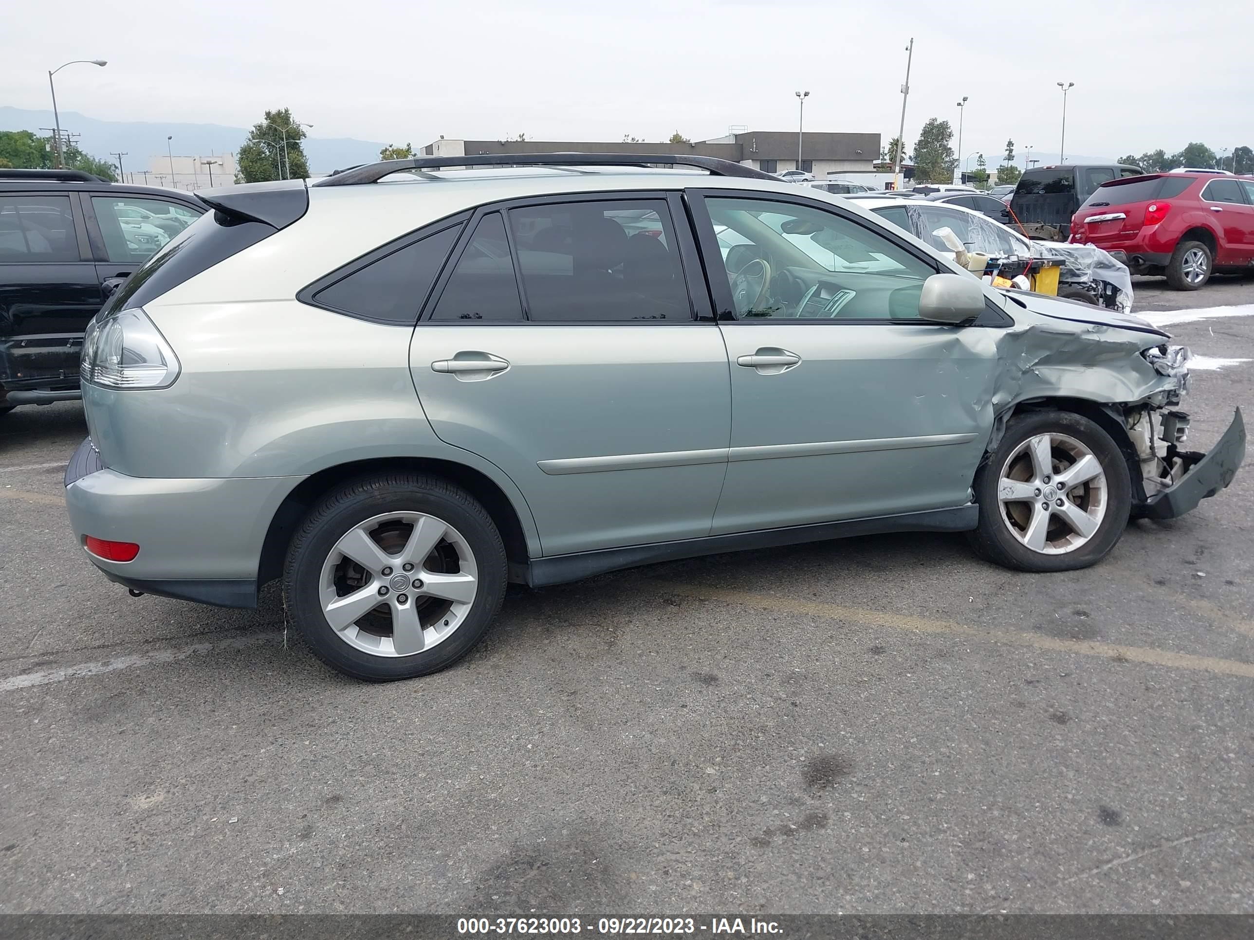 Photo 12 VIN: JTJGA31U350051804 - LEXUS RX 