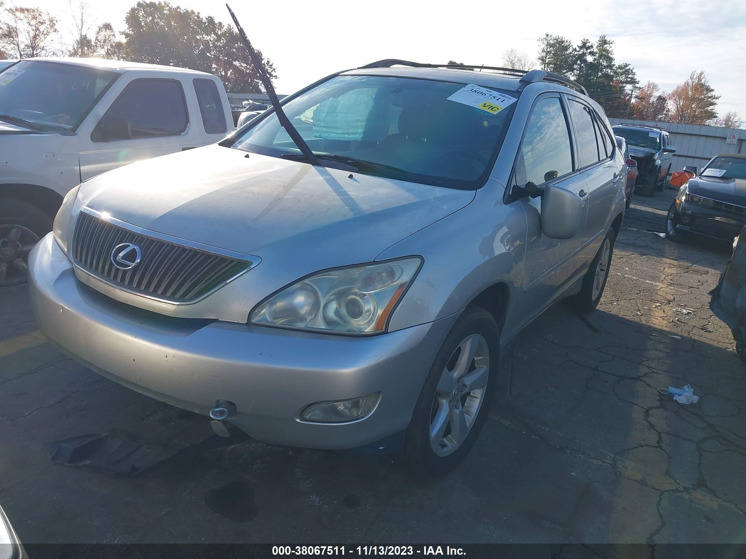 Photo 1 VIN: JTJGA31U440034721 - LEXUS RX 