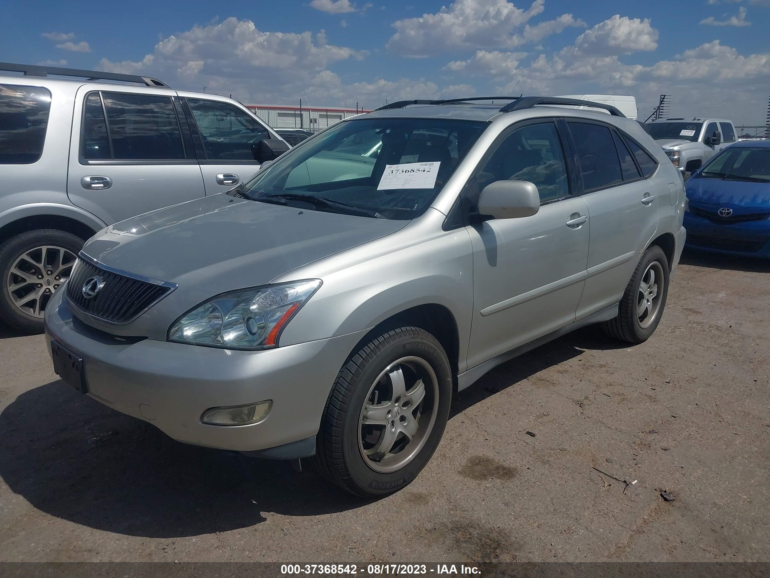 Photo 1 VIN: JTJGA31UX40044234 - LEXUS RX 