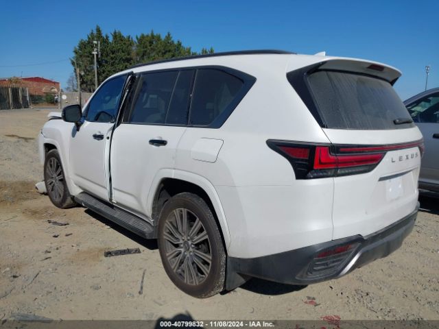 Photo 2 VIN: JTJGB7CX9P4037882 - LEXUS LX 