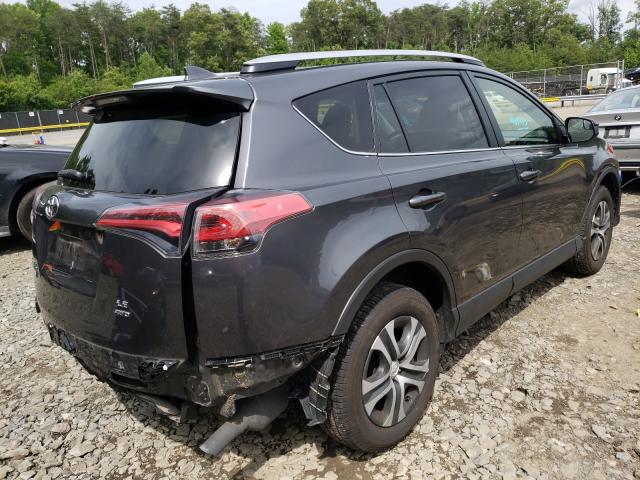 Photo 3 VIN: JTMBFREV8GJ100321 - TOYOTA RAV4 LE 