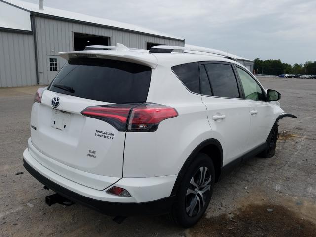 Photo 3 VIN: JTMBFREVXGD181742 - TOYOTA RAV4 LE 