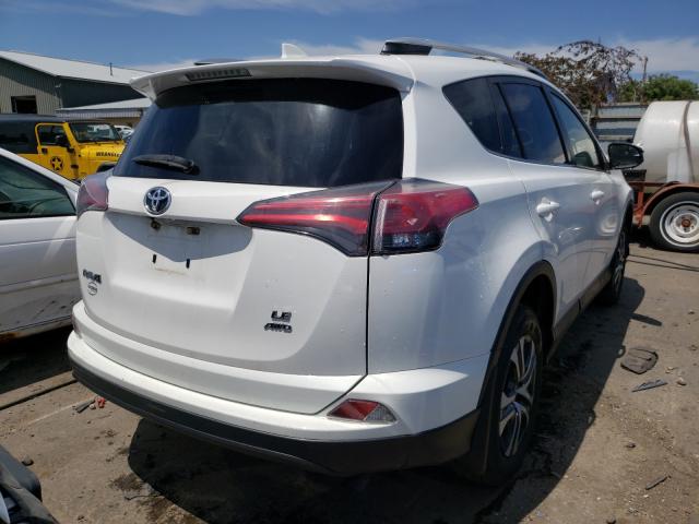 Photo 3 VIN: JTMBFREVXGJ099284 - TOYOTA RAV4 LE 