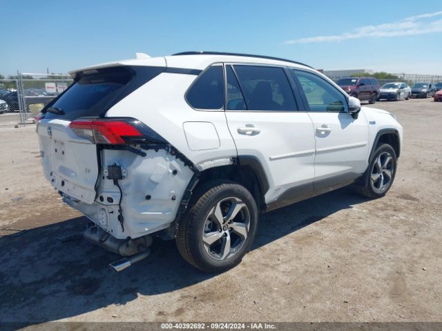 Photo 3 VIN: JTMCB3FV0PD117494 - TOYOTA RAV4 PRIME 