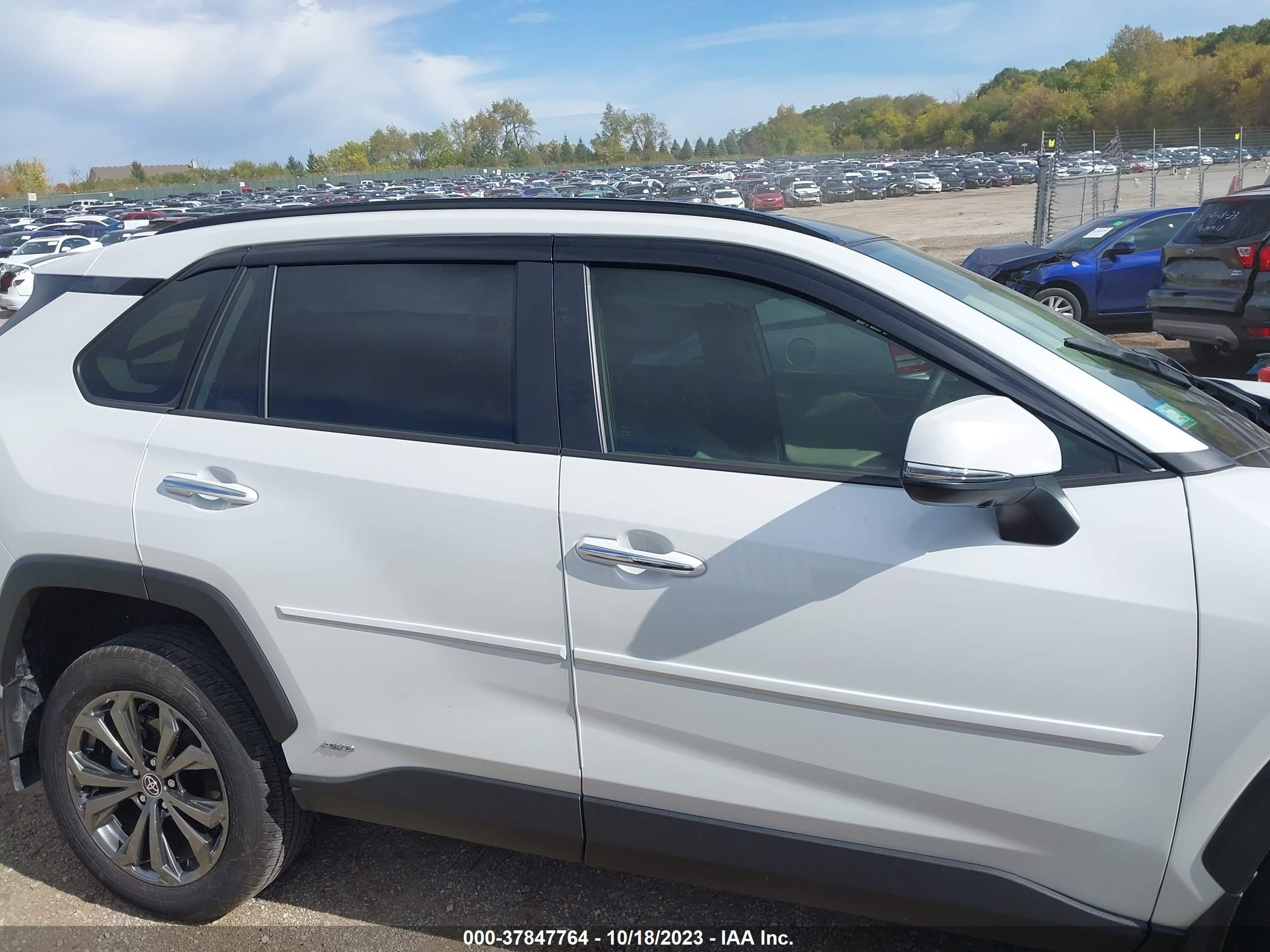 Photo 12 VIN: JTMD6RFV0PD093211 - TOYOTA RAV 4 