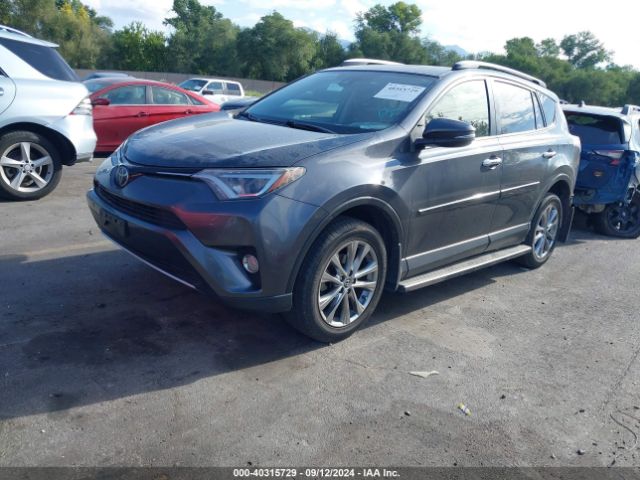 Photo 1 VIN: JTMDFREV0GD184447 - TOYOTA RAV4 