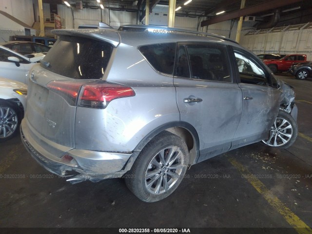 Photo 3 VIN: JTMDFREV0JD239938 - TOYOTA RAV4 