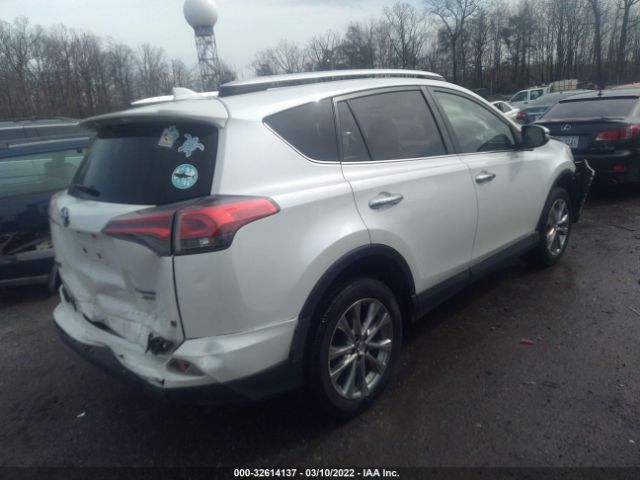 Photo 3 VIN: JTMDFREV2GJ064554 - TOYOTA RAV4 