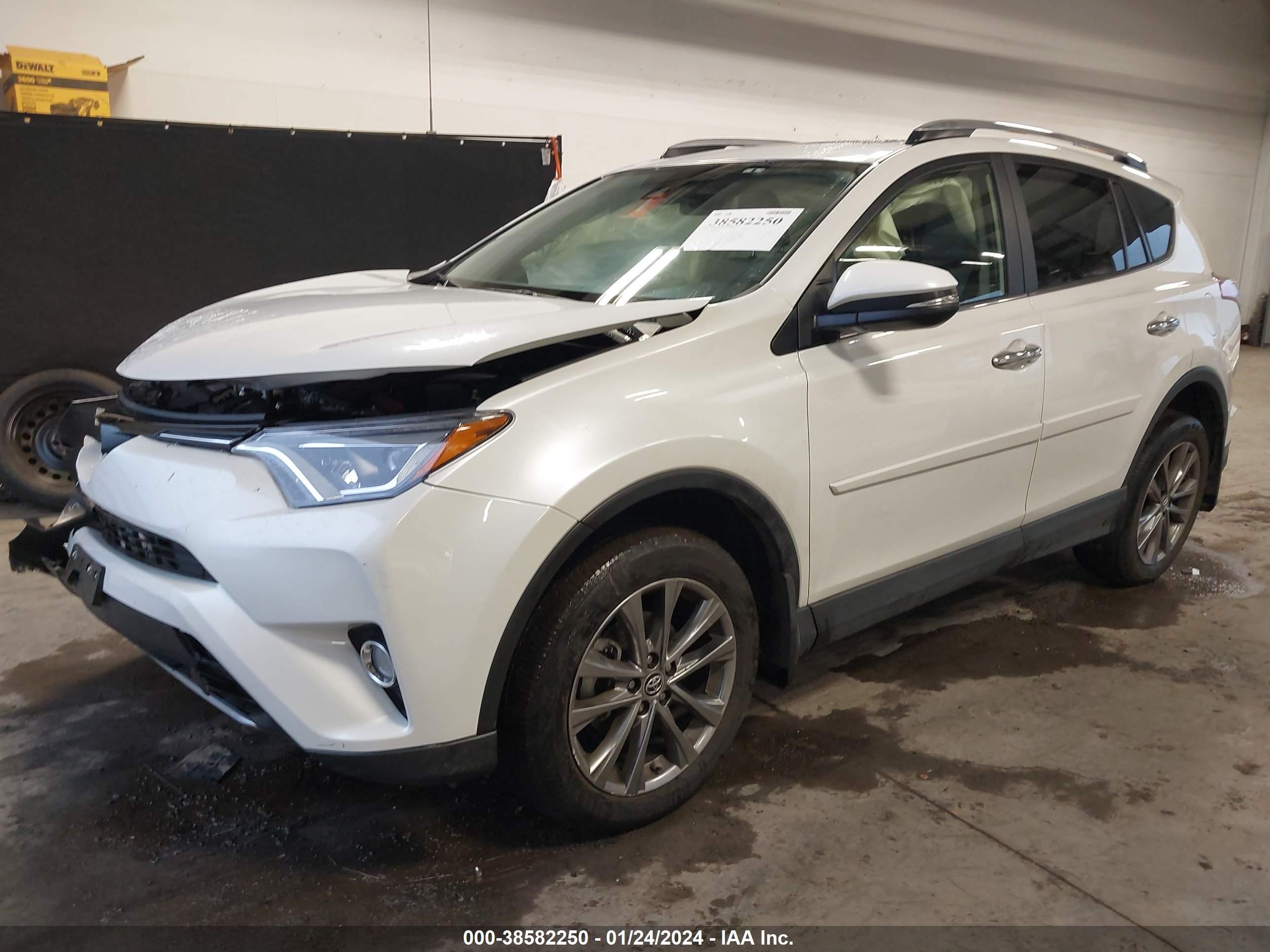 Photo 1 VIN: JTMDFREV5JJ717613 - TOYOTA RAV 4 