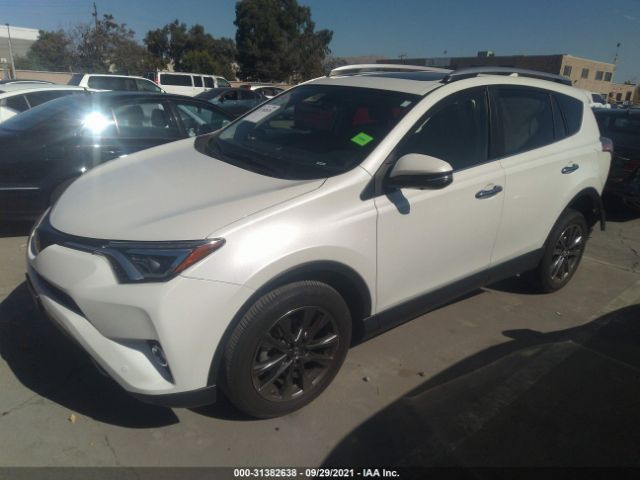 Photo 1 VIN: JTMDFREV6JJ204533 - TOYOTA RAV4 