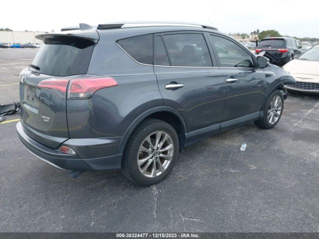 Photo 3 VIN: JTMDFREV8JD229061 - TOYOTA RAV4 