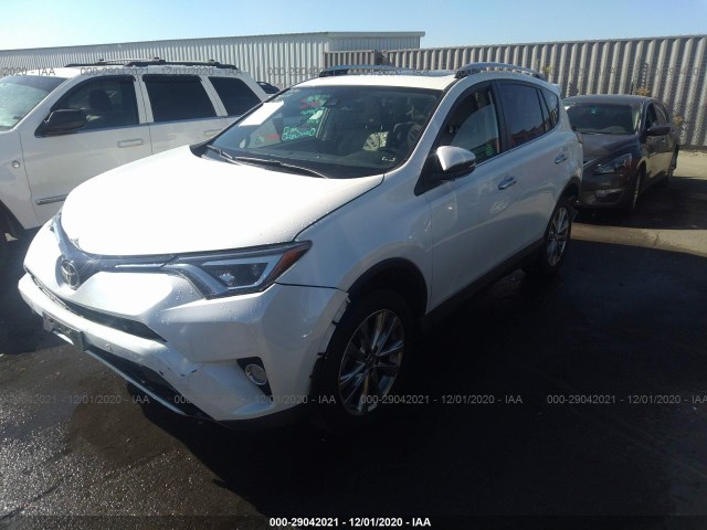 Photo 1 VIN: JTMDFREVXGD188117 - TOYOTA RAV4 