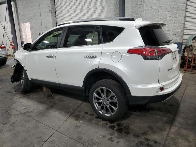 Photo 1 VIN: JTMDFREVXJJ718563 - TOYOTA RAV4 