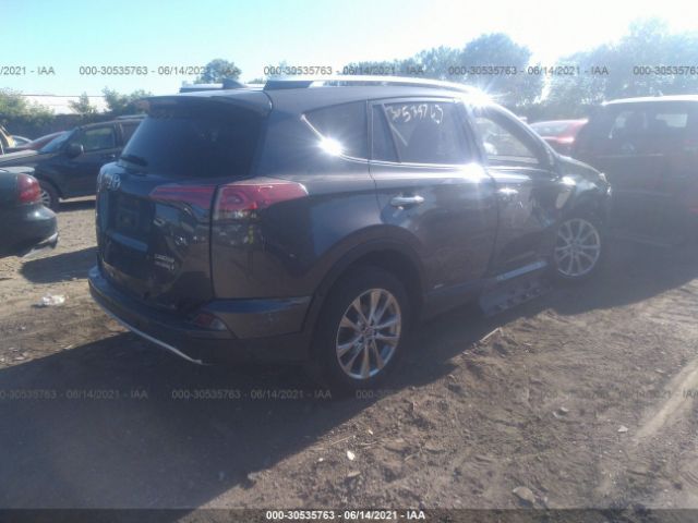 Photo 3 VIN: JTMDJREV0GD047796 - TOYOTA RAV4 HYBRID 