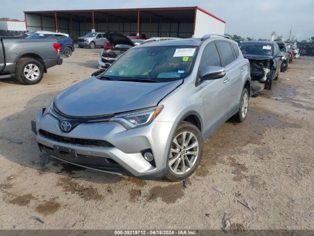 Photo 1 VIN: JTMDJREV0JD172613 - TOYOTA RAV4 HV 