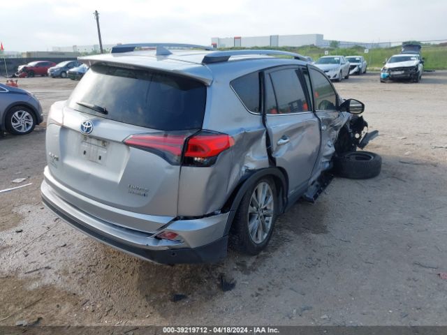 Photo 3 VIN: JTMDJREV0JD172613 - TOYOTA RAV4 HV 