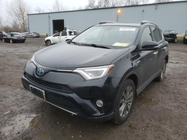 Photo 1 VIN: JTMDJREV0JD249853 - TOYOTA RAV4 HV LI 