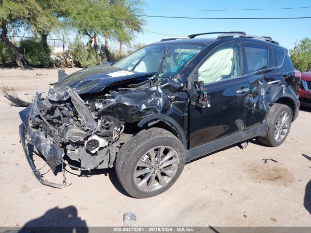 Photo 1 VIN: JTMDJREV1GD027217 - TOYOTA RAV4 