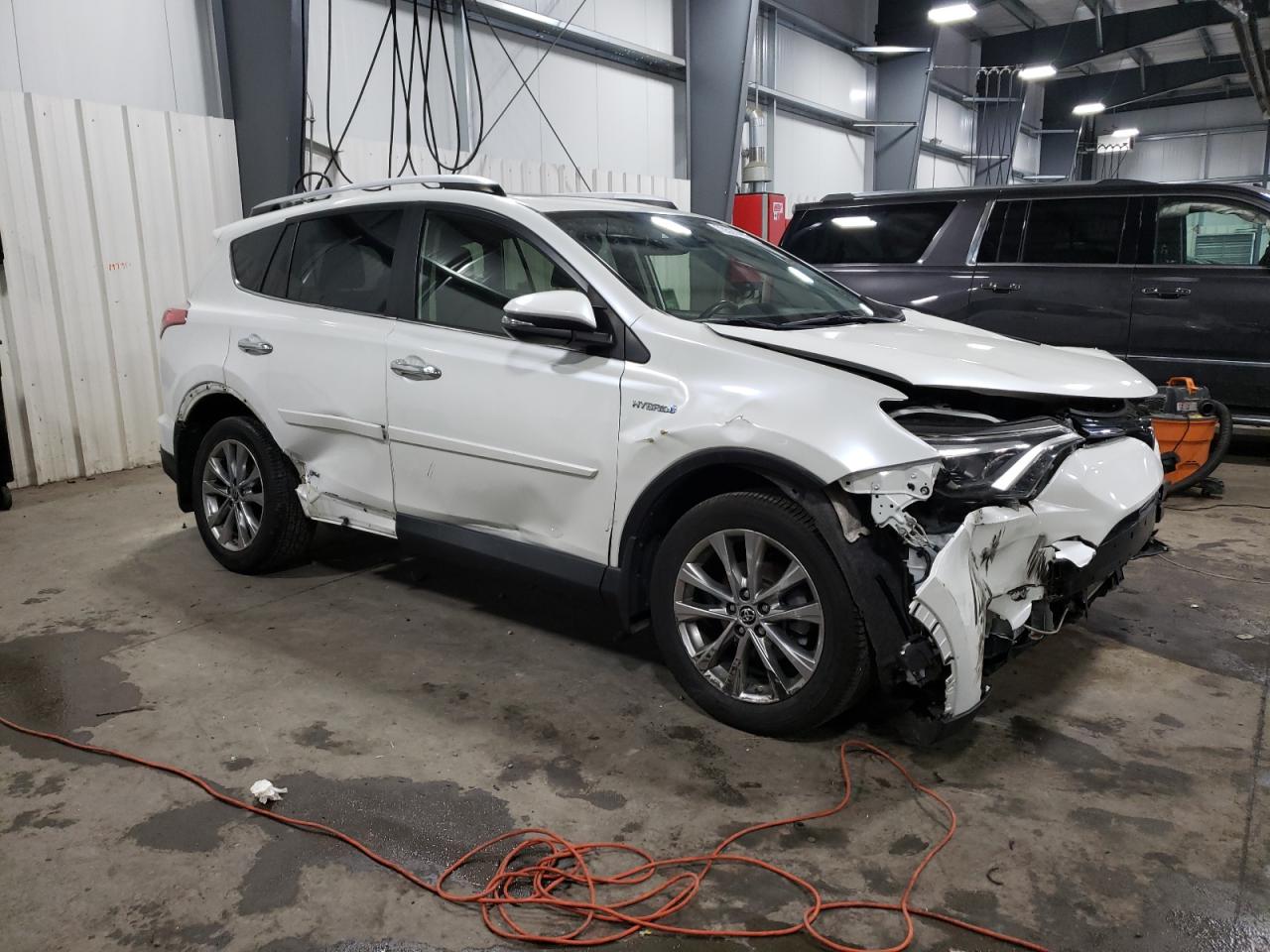 Photo 3 VIN: JTMDJREV2GD017103 - TOYOTA RAV-4 HYBRID 