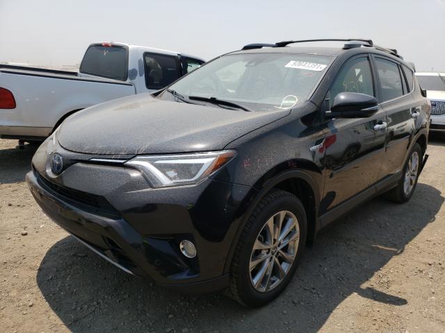 Photo 1 VIN: JTMDJREV2JD184942 - TOYOTA RAV4 HV LI 