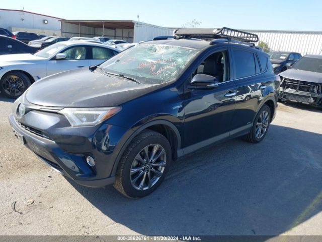 Photo 1 VIN: JTMDJREV2JD185587 - TOYOTA RAV4 HYBRID 