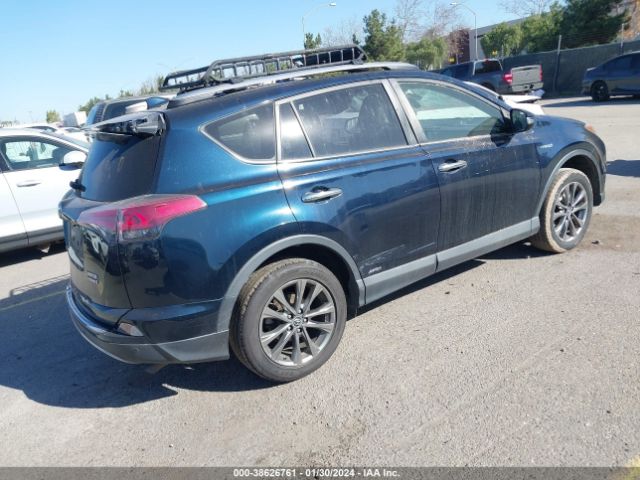 Photo 3 VIN: JTMDJREV2JD185587 - TOYOTA RAV4 HYBRID 