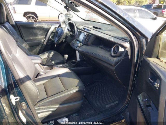 Photo 4 VIN: JTMDJREV2JD185587 - TOYOTA RAV4 HYBRID 