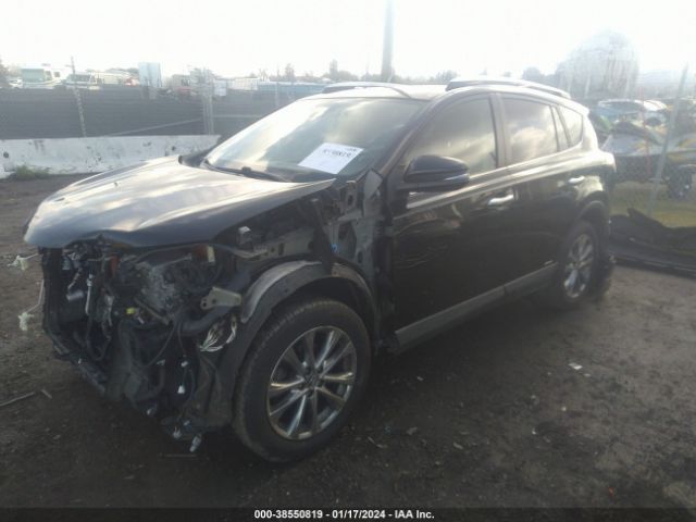 Photo 1 VIN: JTMDJREV3GD049297 - TOYOTA RAV4 HYBRID 