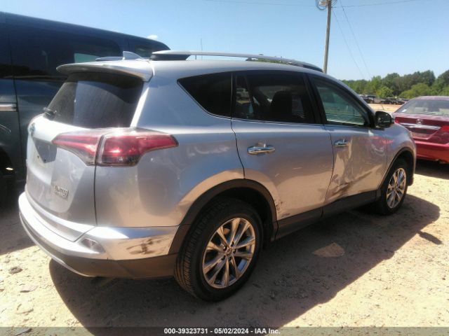 Photo 3 VIN: JTMDJREV6GD031327 - TOYOTA RAV4 HYBRID 