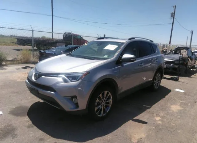 Photo 1 VIN: JTMDJREV6JD174950 - TOYOTA RAV4 