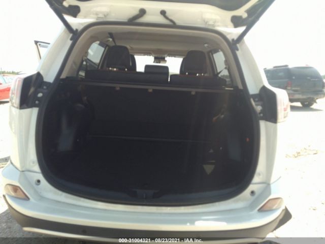 Photo 7 VIN: JTMDJREV7GD013919 - TOYOTA RAV4 HYBRID 