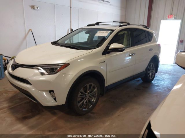 Photo 1 VIN: JTMDJREV7JD172737 - TOYOTA RAV4 HYBRID 