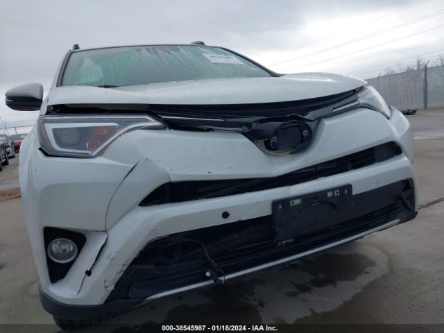 Photo 5 VIN: JTMDJREV7JD176335 - TOYOTA RAV4 HYBRID 