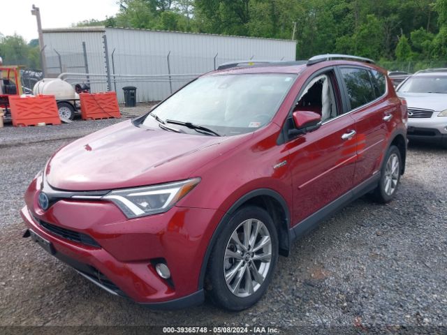 Photo 1 VIN: JTMDJREV8JD166879 - TOYOTA RAV4 HYBRID 