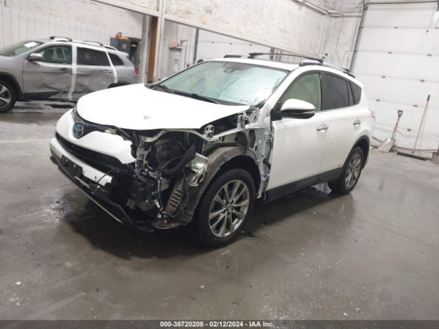 Photo 1 VIN: JTMDJREV8JD231875 - TOYOTA RAV4 HYBRID 