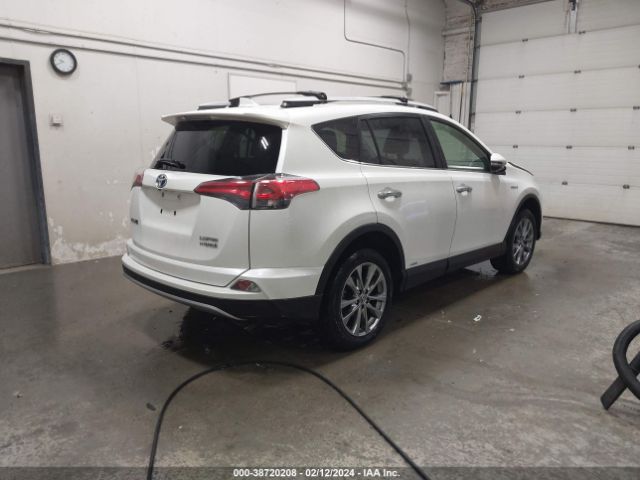 Photo 3 VIN: JTMDJREV8JD231875 - TOYOTA RAV4 HYBRID 