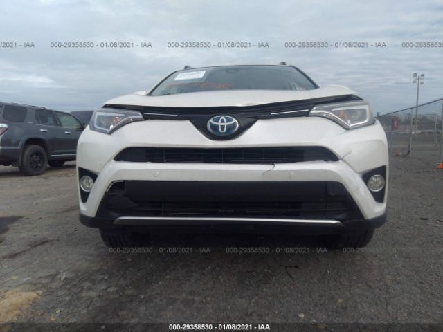 Photo 5 VIN: JTMDJREV9GD009967 - TOYOTA RAV4 HYBRID 