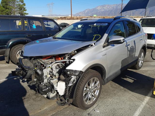 Photo 1 VIN: JTMDJREV9GD038983 - TOYOTA RAV4 