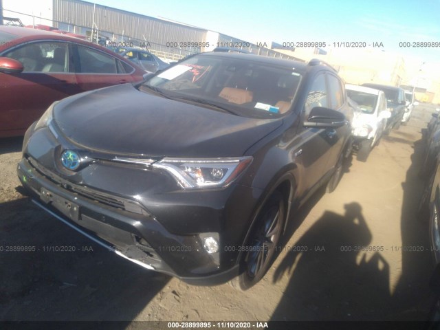 Photo 1 VIN: JTMDJREVXGD020959 - TOYOTA RAV4 HYBRID 