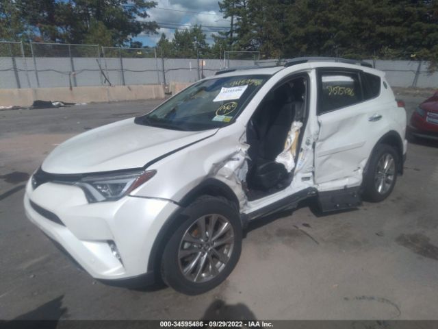 Photo 1 VIN: JTMDJREVXJD165894 - TOYOTA RAV4 